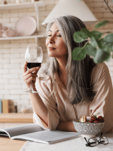 Woman drinking a glass of wine